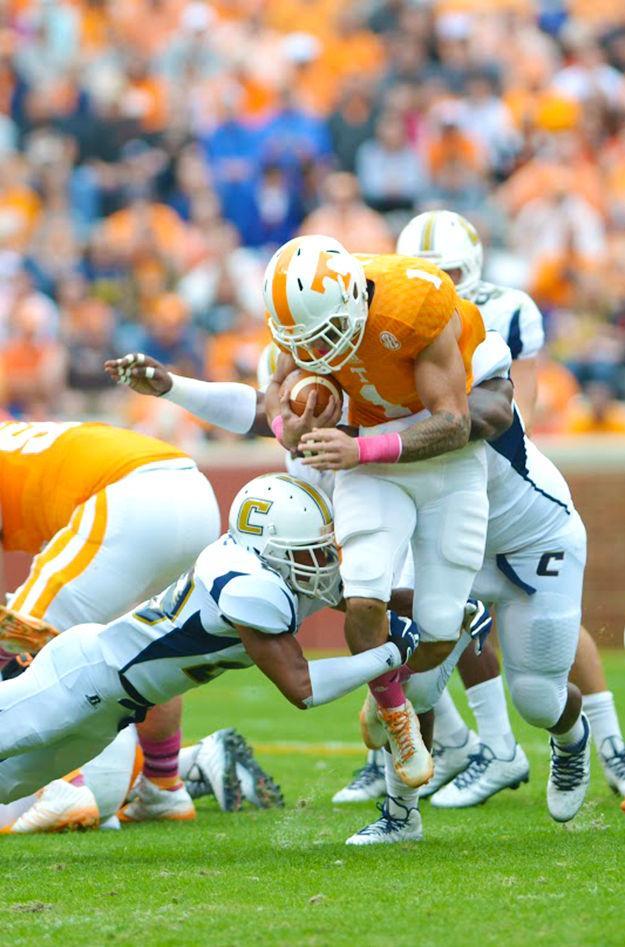Freshman Jalen Hurd looks to dodge a grab during the Saturday's game against Chattanooga at Neyland Stadium.