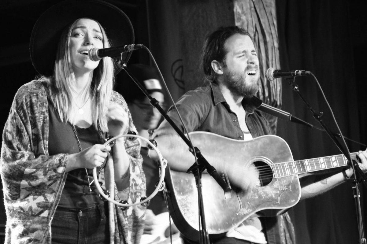 Josh and Nicole Johnson, husband and wife duo of Elenowen, performing at the Concourse at the International on Friday.
