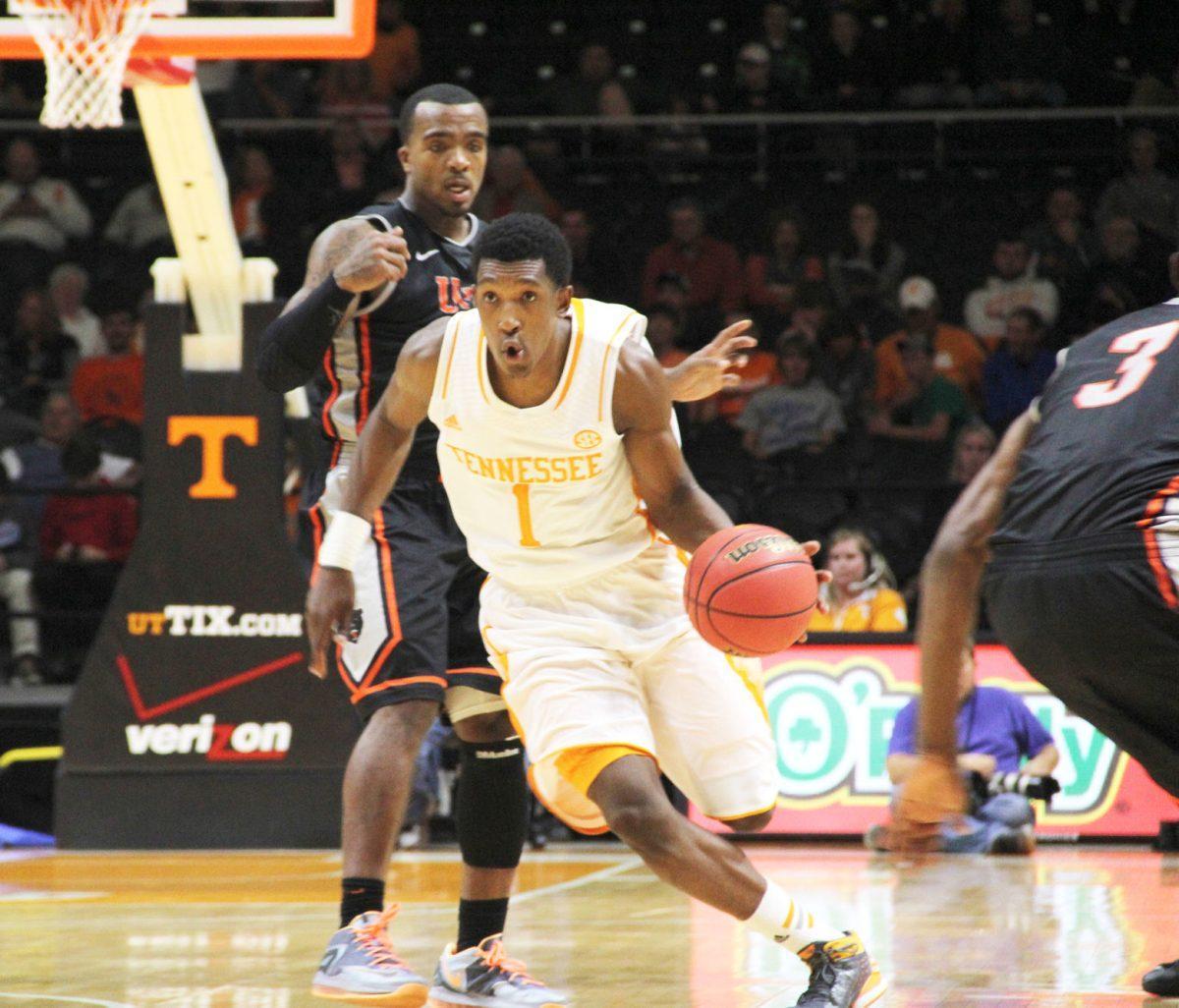 Senior Josh Richardson dribbles the ball during the 80-62 victory game against Pikeville.