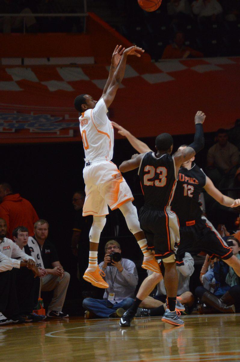 Junior guard Kevin Punter attempts a jump shot over Pikeville's Macari Brooks during the Vols' 80-62 exhibition win over the Bears on Nov. 3.