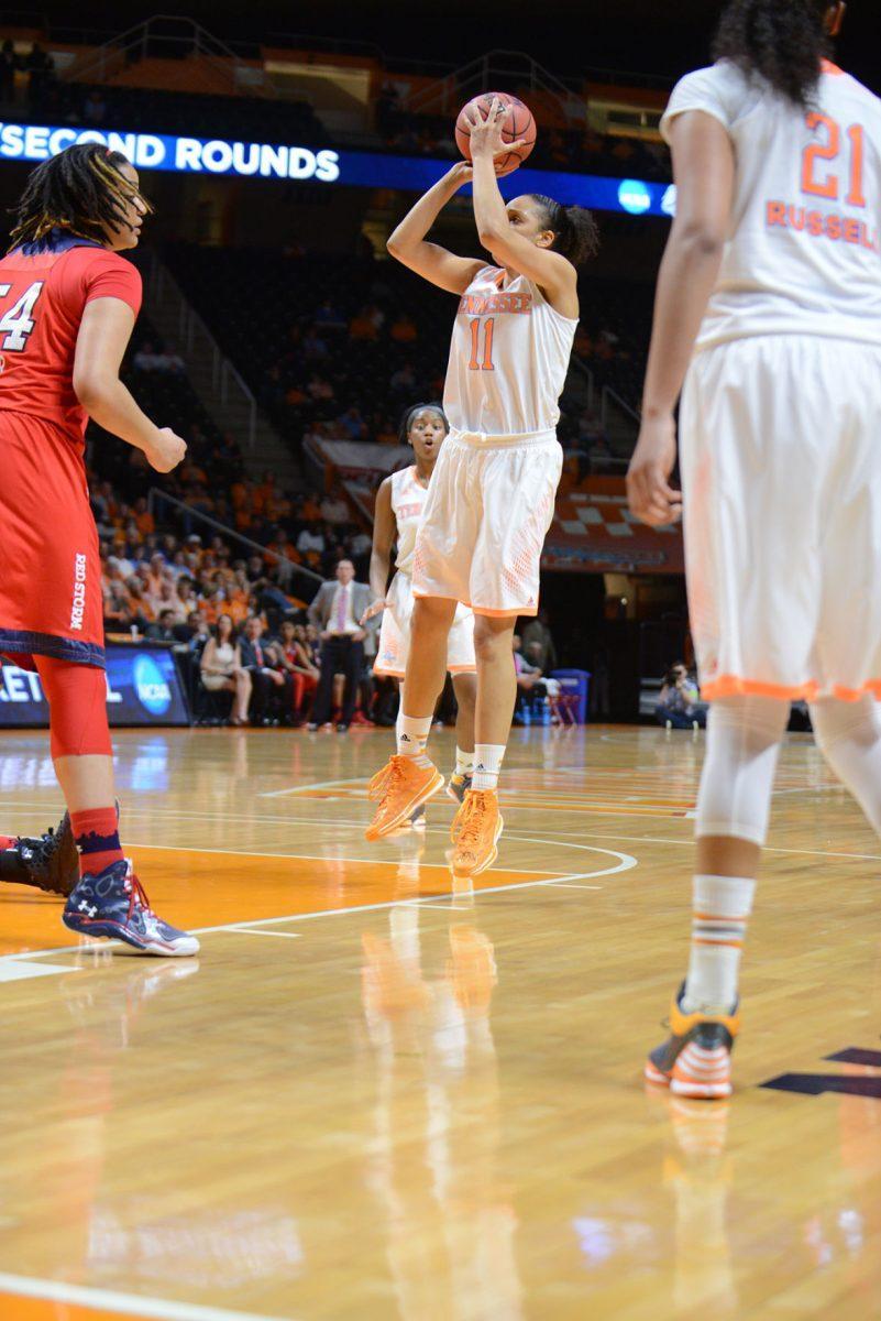 Senior forward Cierra Burdick pulls up for a jump shot against St. John's on March 24.