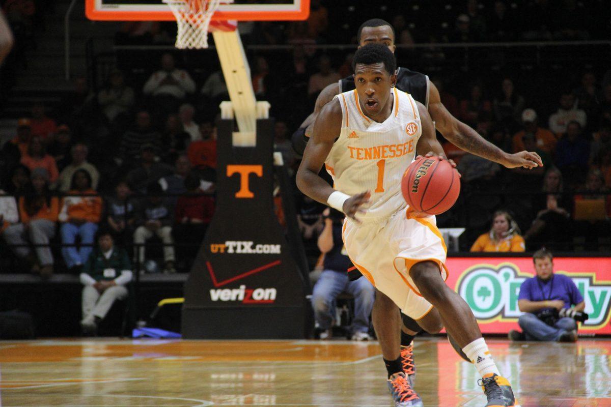Senior Josh Richardson pushes the ball up court during the 80-62 victory game against Pikeville.