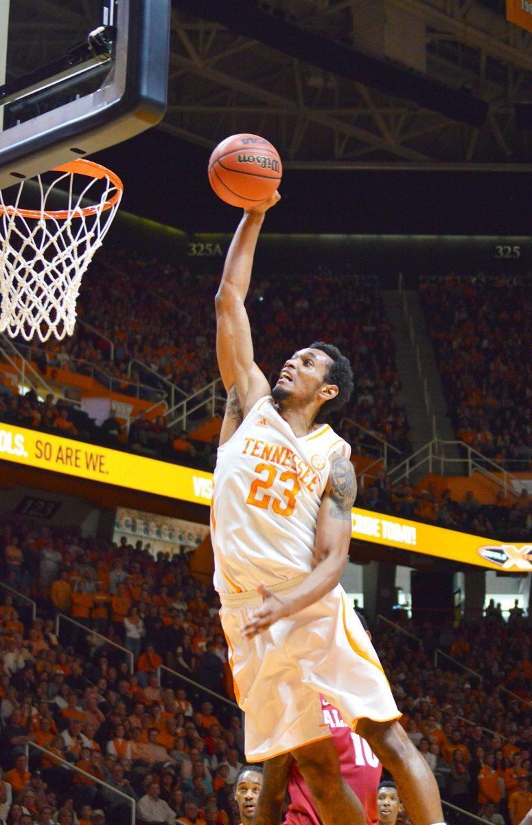 Junior Derek Reese dunks the ball during the game against Alabama Saturday, Jan. 10.