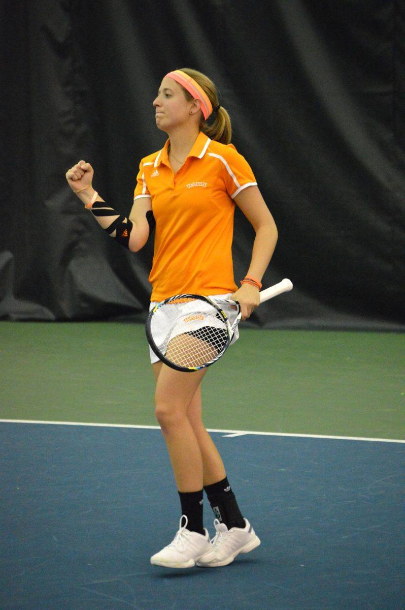 Senior Caitlyn Williams celebrates a win on March 30, 2014.