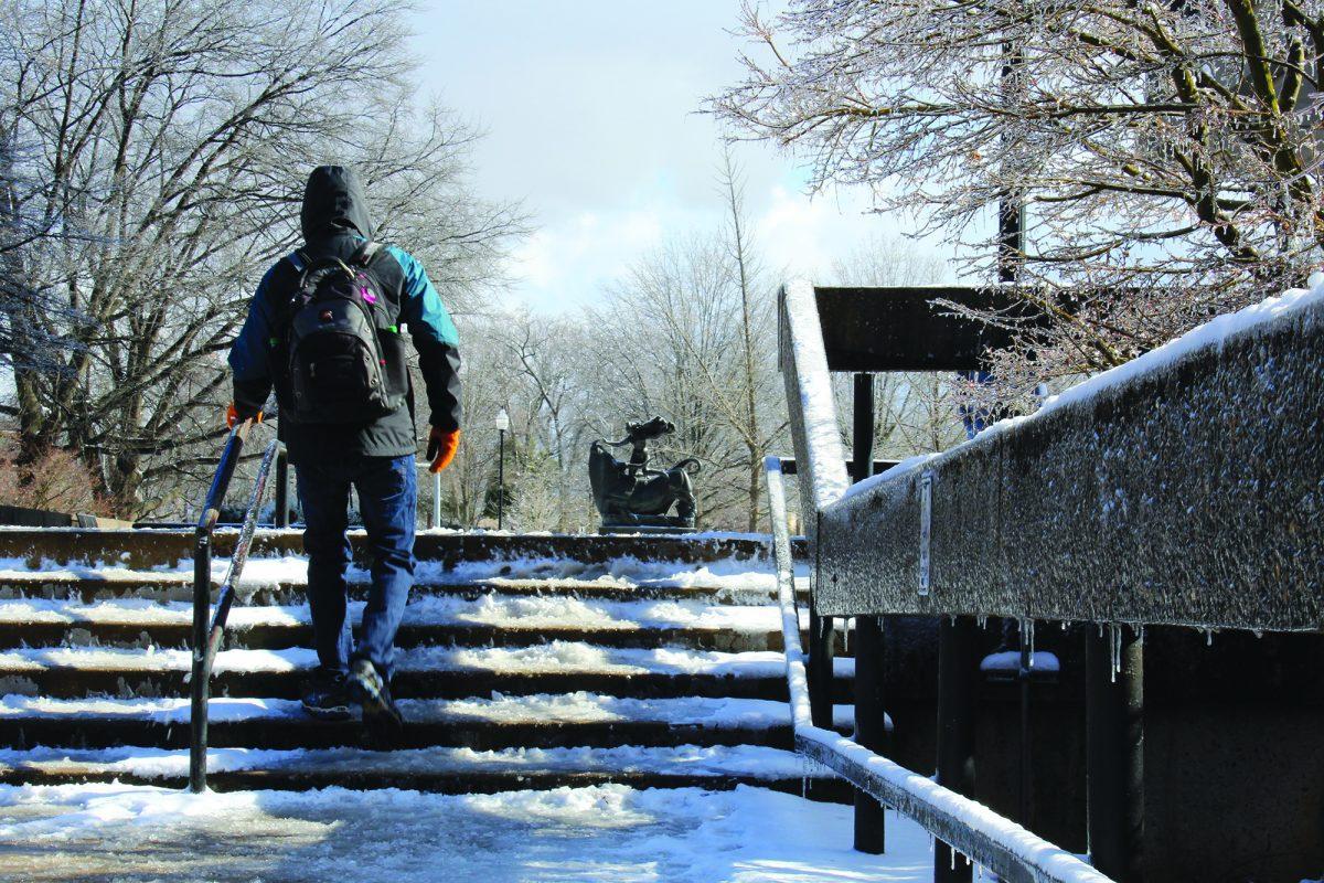 Layers of ice and snow cover campus Wednesday.