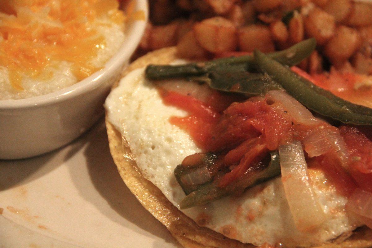 Huevos rancheros, cheesy grits and breakfast potatoes from Downtown Grill and Brewery's brunch menu.