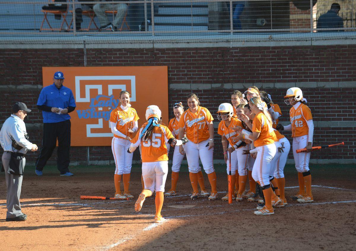 Meghan Gregg, 55, runs home after hitting one of her four home runs during UT's five-game tournament this weekend.