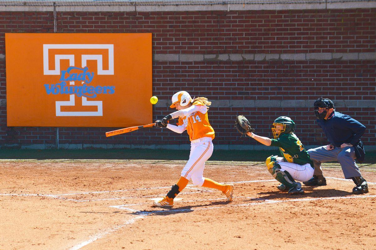 Sophomore Megan Geer hits the balls during the game against Northern Iowa on March 7.