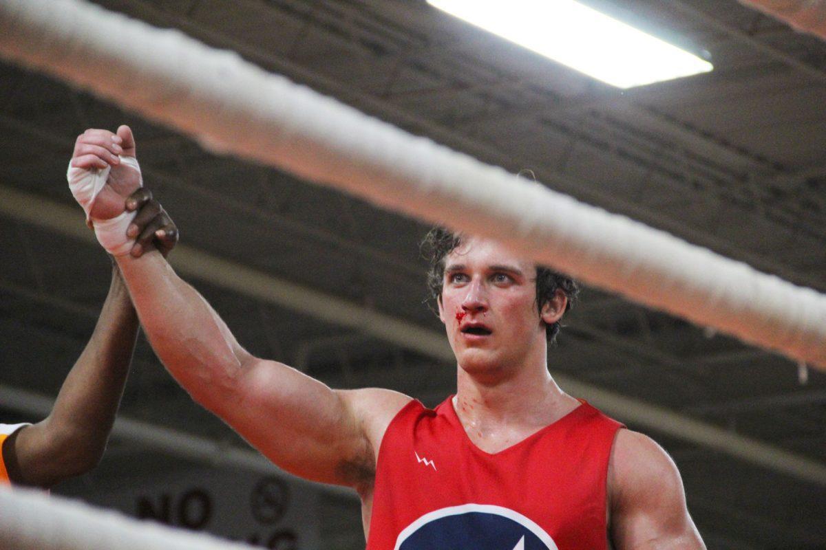 Dimitriy Petrov of Sigma Phi Epsilon is announced the winner of the Crusierweight Division on Saturday.