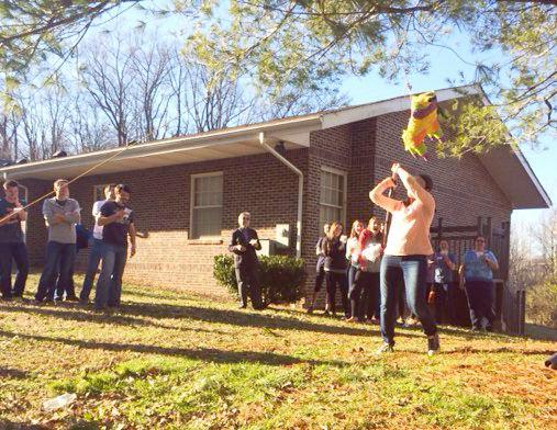 Students hit a pinata during Spanish Immersion Day on March 7.