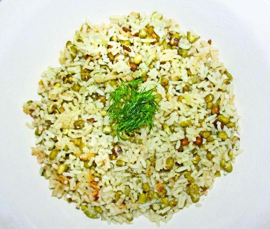 Ayman Yunis, from Iraq, has been in the U.S. for two months and enjoys a bean dish from Iraq.