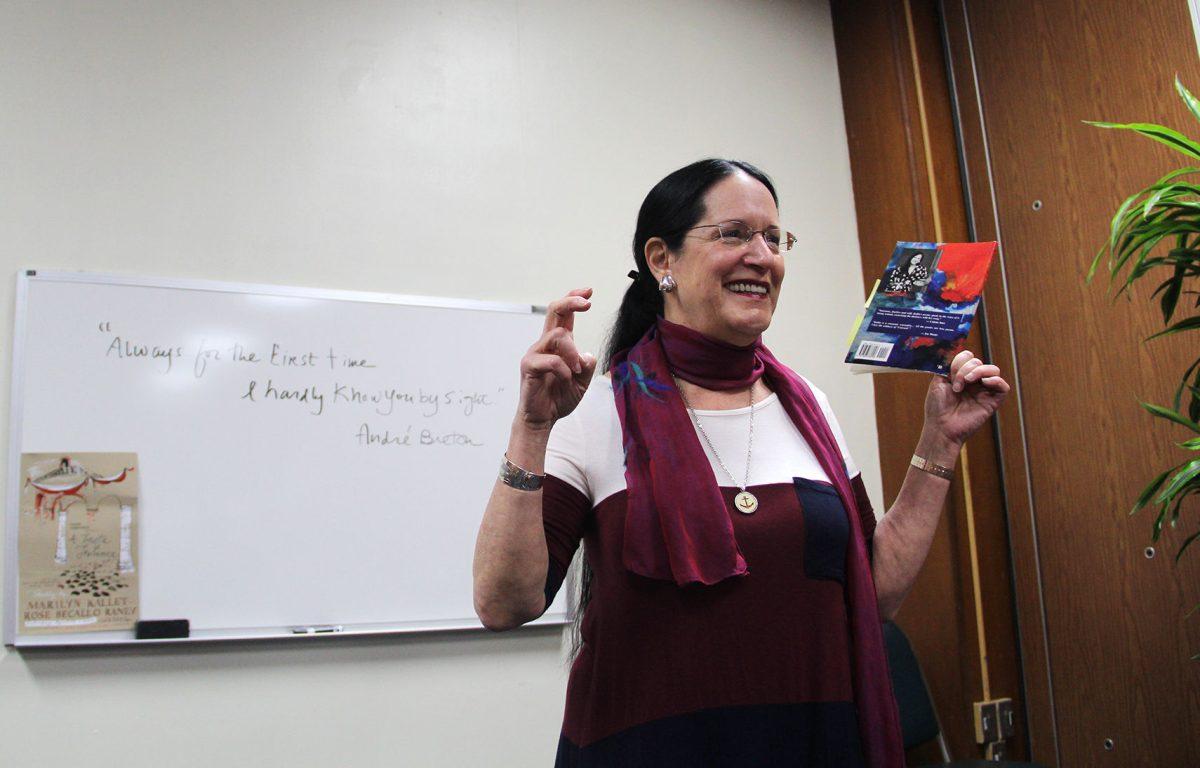 Marilyn Kallet, director of UT's creative writing program, recites one of her poems during "Love Poems in the Afternoon."