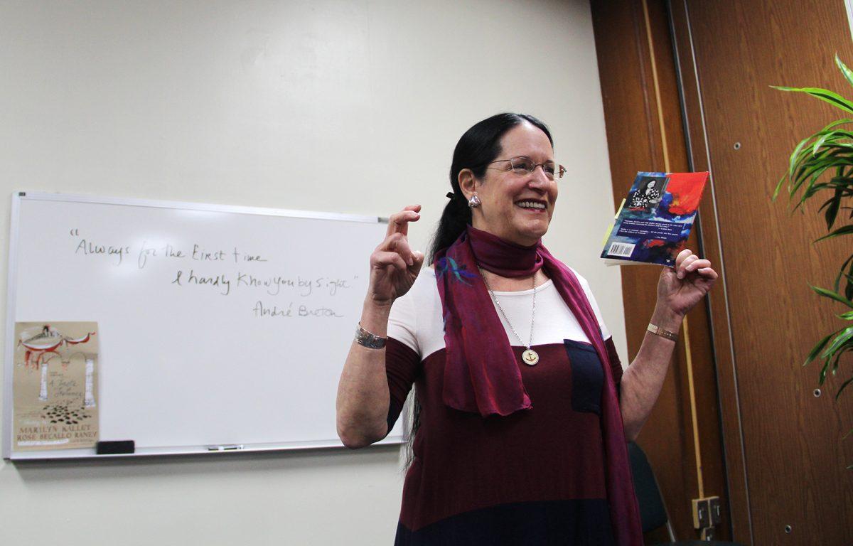 Marilyn Kallet, director of UT's creative writing program, recites one of her poems during "Love Poems in the Afternoon."