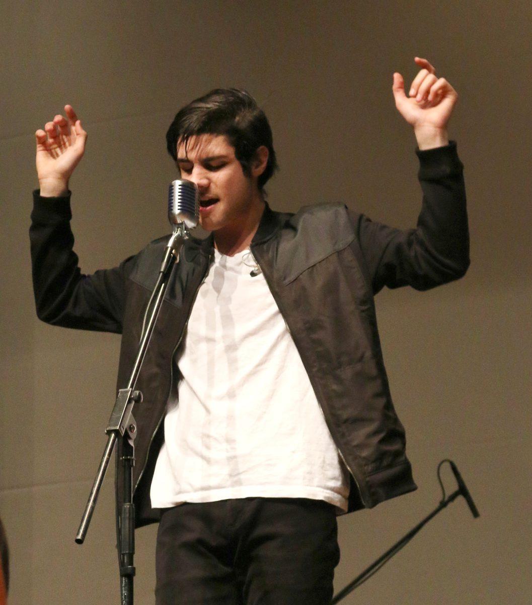 Arman Asadsangabi, lead singer of The Screens, performs during Battle of the Bands on March 5.