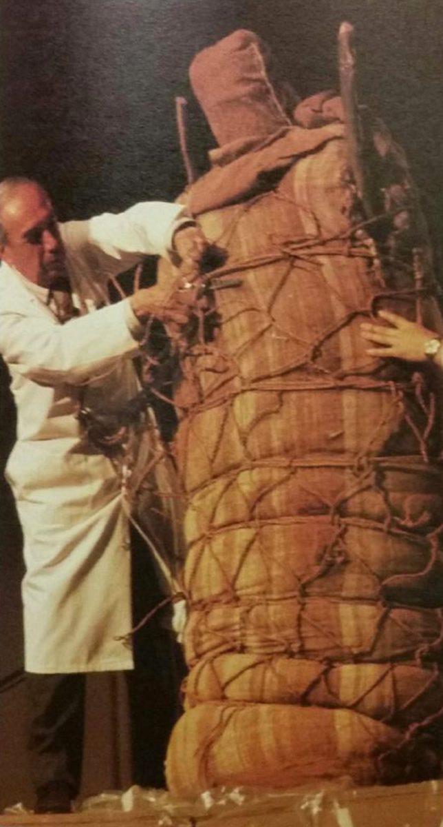 Scientists unwrap the mummy of a 2-year-old Native American child at the 1982 World's Fair.