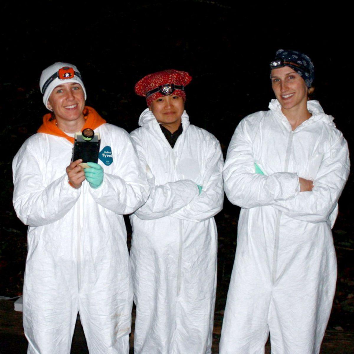 Riley Bernard (left) and her colleagues Anna Chow (center) and Devin Jones (right) gather for a cave survey to test bats for disease.