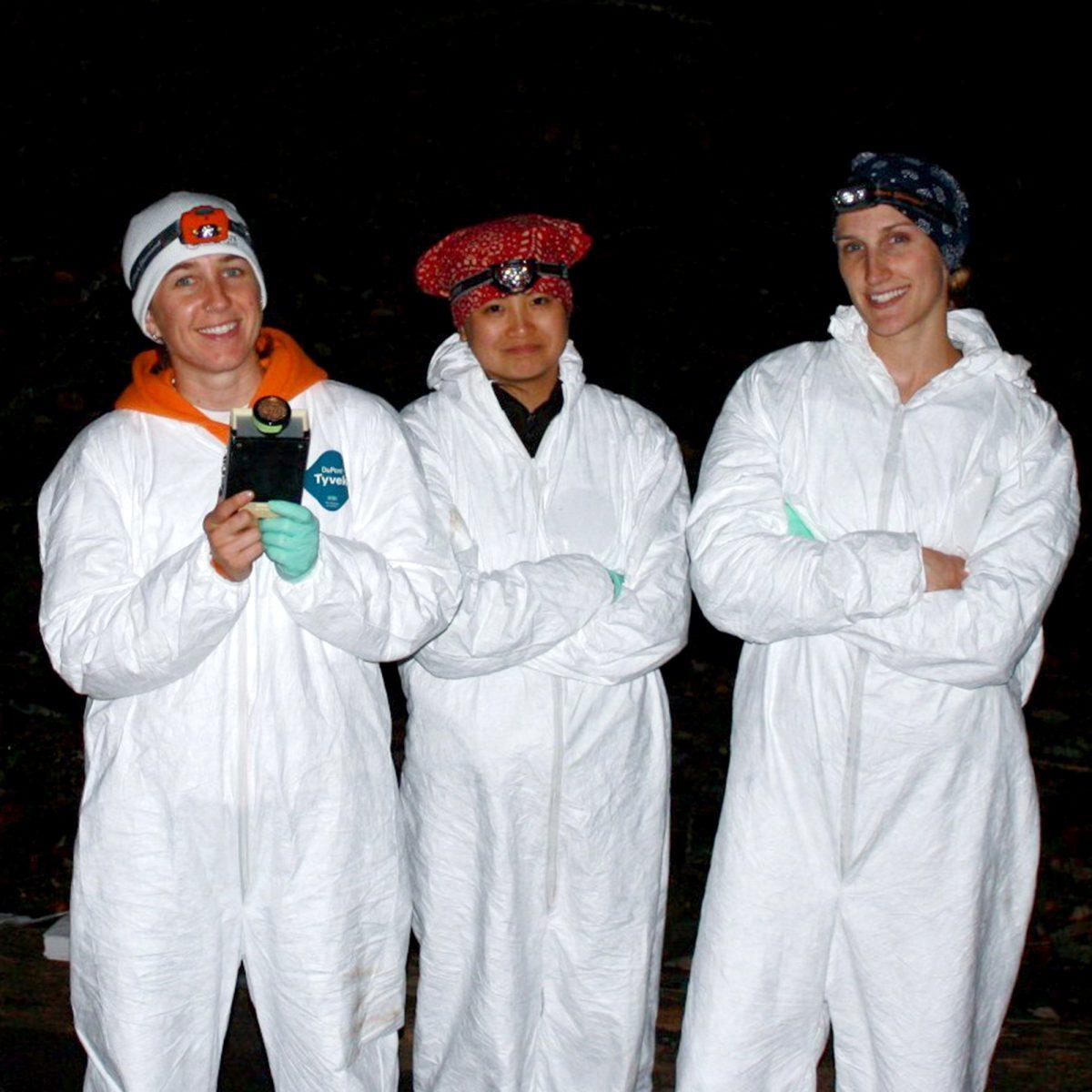Riley Bernard (left) and her colleagues Anna Chow (center) and Devin Jones (right) gather for a cave survey to test bats for disease.
