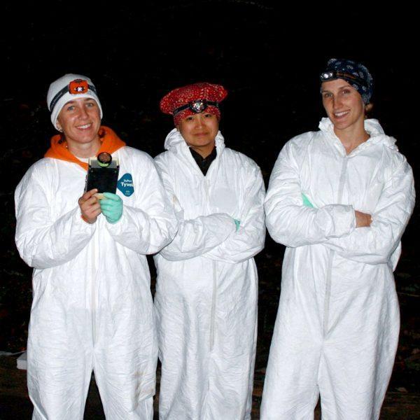 Riley Bernard (left) and her colleagues Anna Chow (center) and Devin Jones (right) gather for a cave survey to test bats for disease.