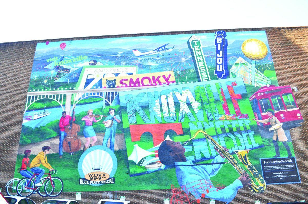 The Knoxville mural is proudly showing off different aspects of the beautiful city on Gay Street.