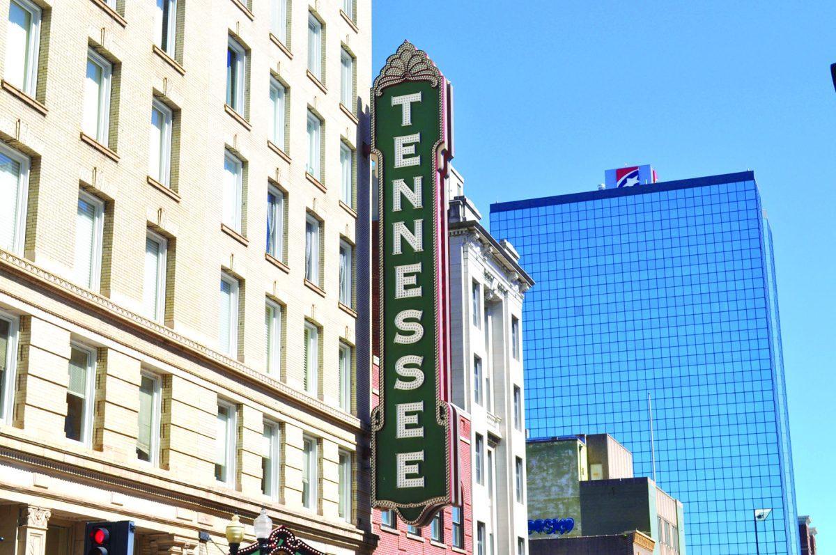 The Tennessee Theater sign hangs big and can be seen overlooking Gay Street.