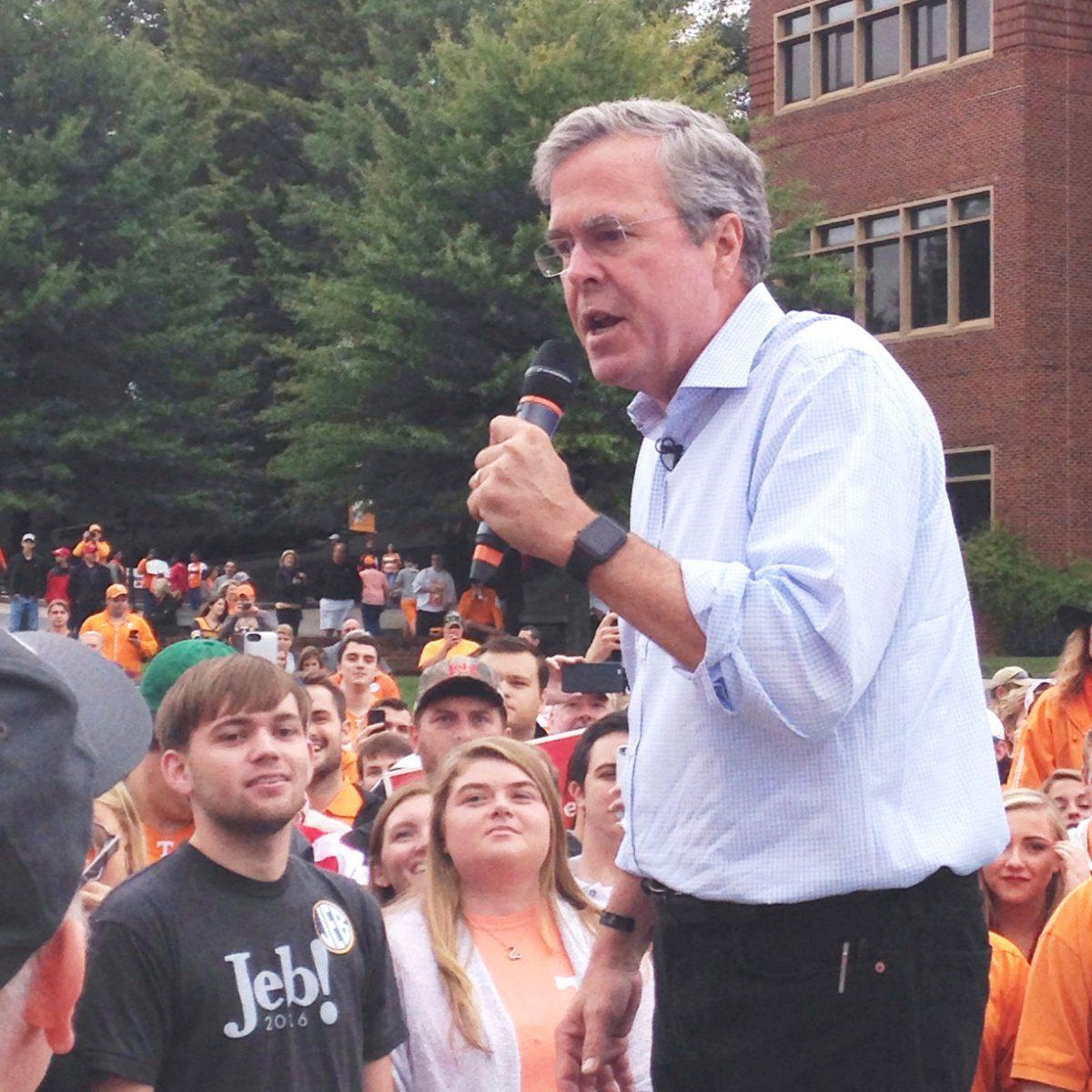 As fans were tailgating on the eve of Tennessee's victory over Georgia, there was a very different crowd awaiting the arrival of Republican presidential hopeful Jeb Bush outside HSS.