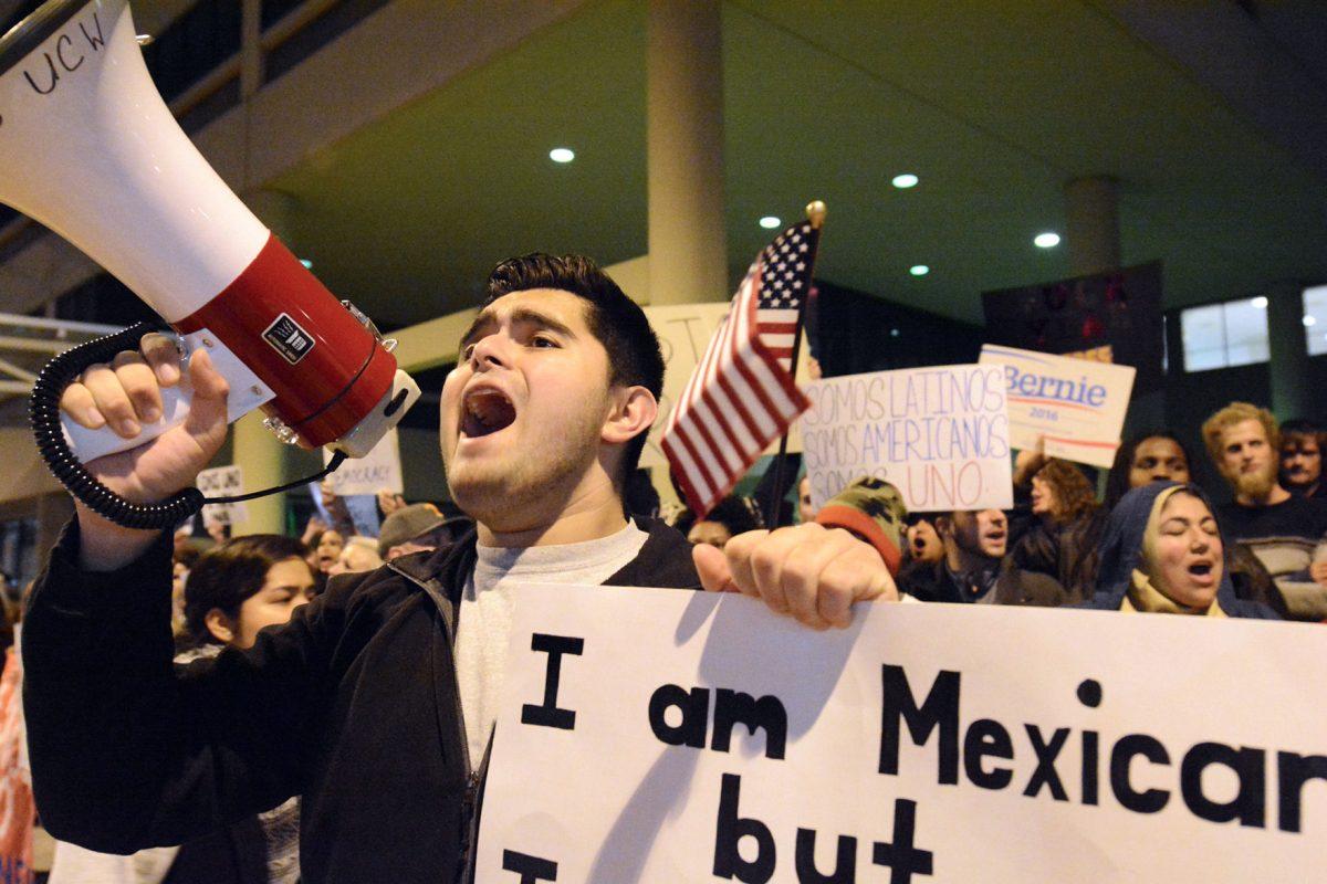 SomosUno and other UT student organizations stood outside the Knoxville Convention Center for hours to protest Trump's anti-immigration policies. 