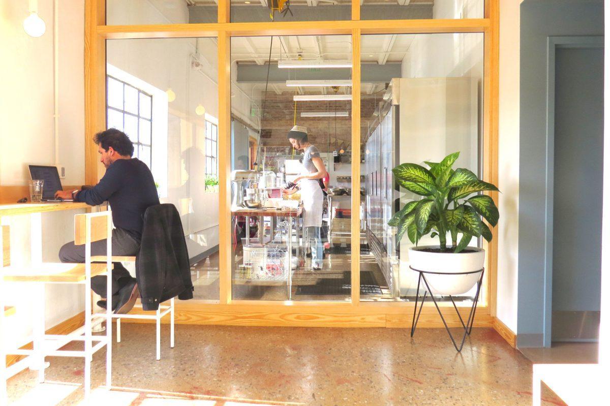 Floor to ceiling windows allow patrons to see into the kitchen.