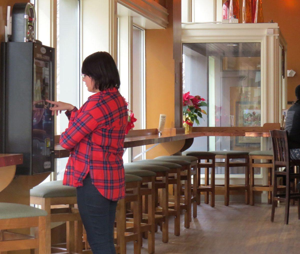 The café mixes both modern and retro influences, such as the touchscreen jukebox.