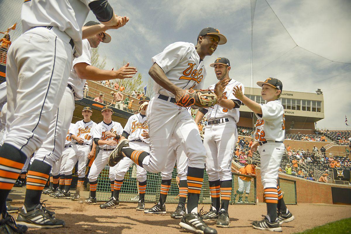 Freshman Vincent Jackson high fives teammates before the game against University of Mississippi Rebels at Lindsey Nelson Stadium in Knoxville, TN on April 20.