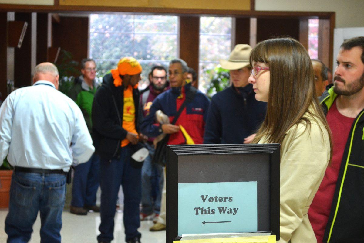Voters wait in line at the Carolyn P. Brown Memorial University Center to participate in early voting. 