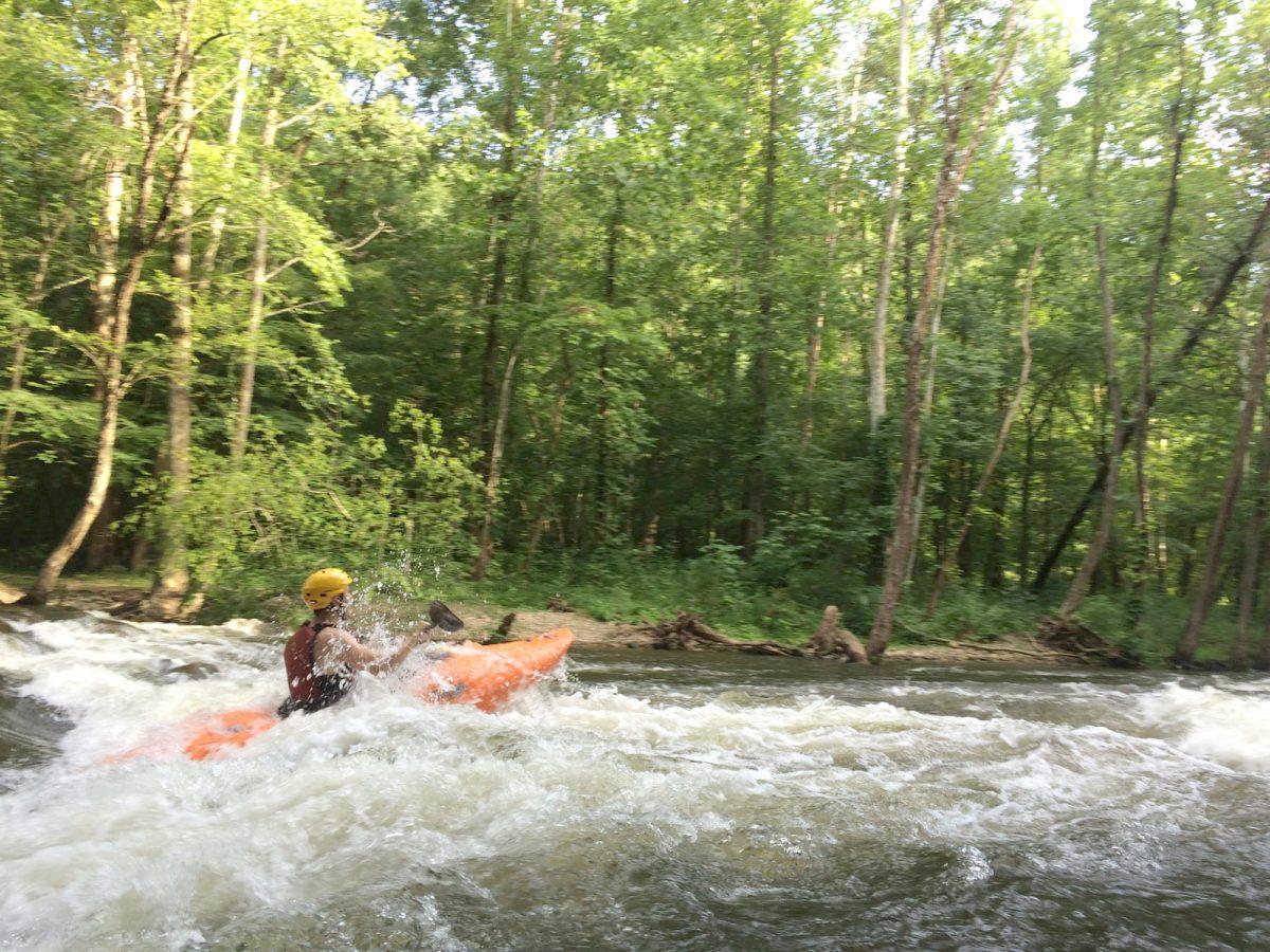 Student taking part in UT Outdoor Pursuits' kayaking trip.