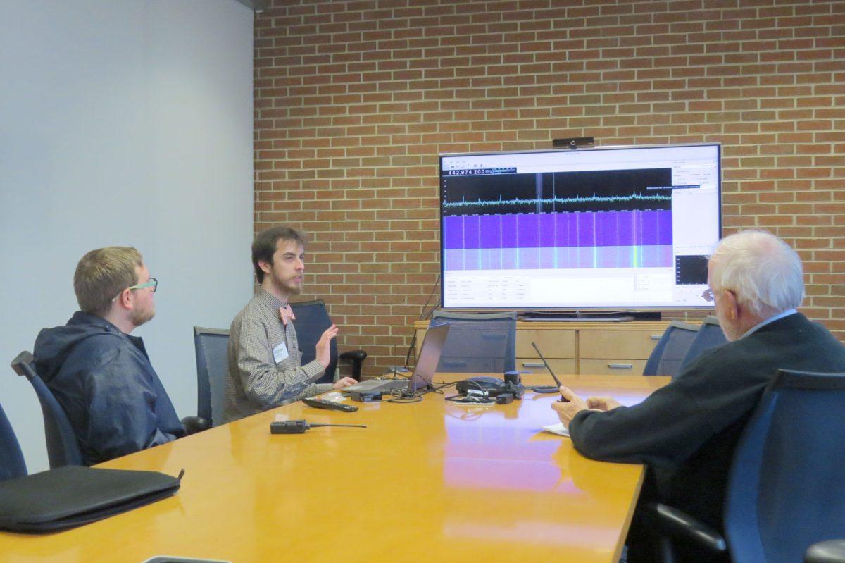 Members of UT's Amateur Radio Club demonstrate how a short wave radio program works.