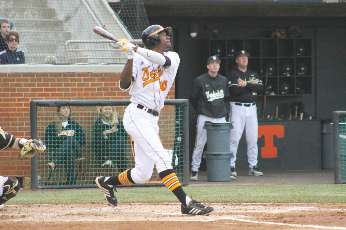 Vincent Jackson, #40, swings and successfully hits a pitch. 
