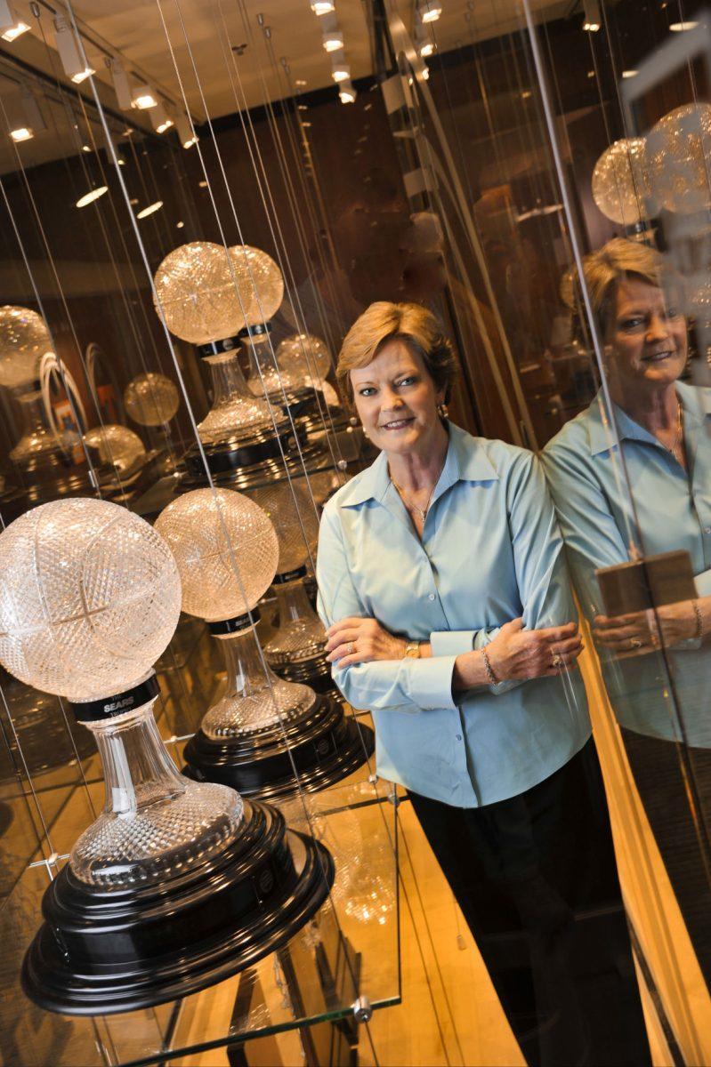 KNOXVILLE,TN - OCTOBER 13, 2011 - Portrait of Head Coach Pat Summitt with all eight of her NCAA National Championship Trophies at Thompson-Boling Arena in Knoxville, TN. Photo By Tennessee Athletics