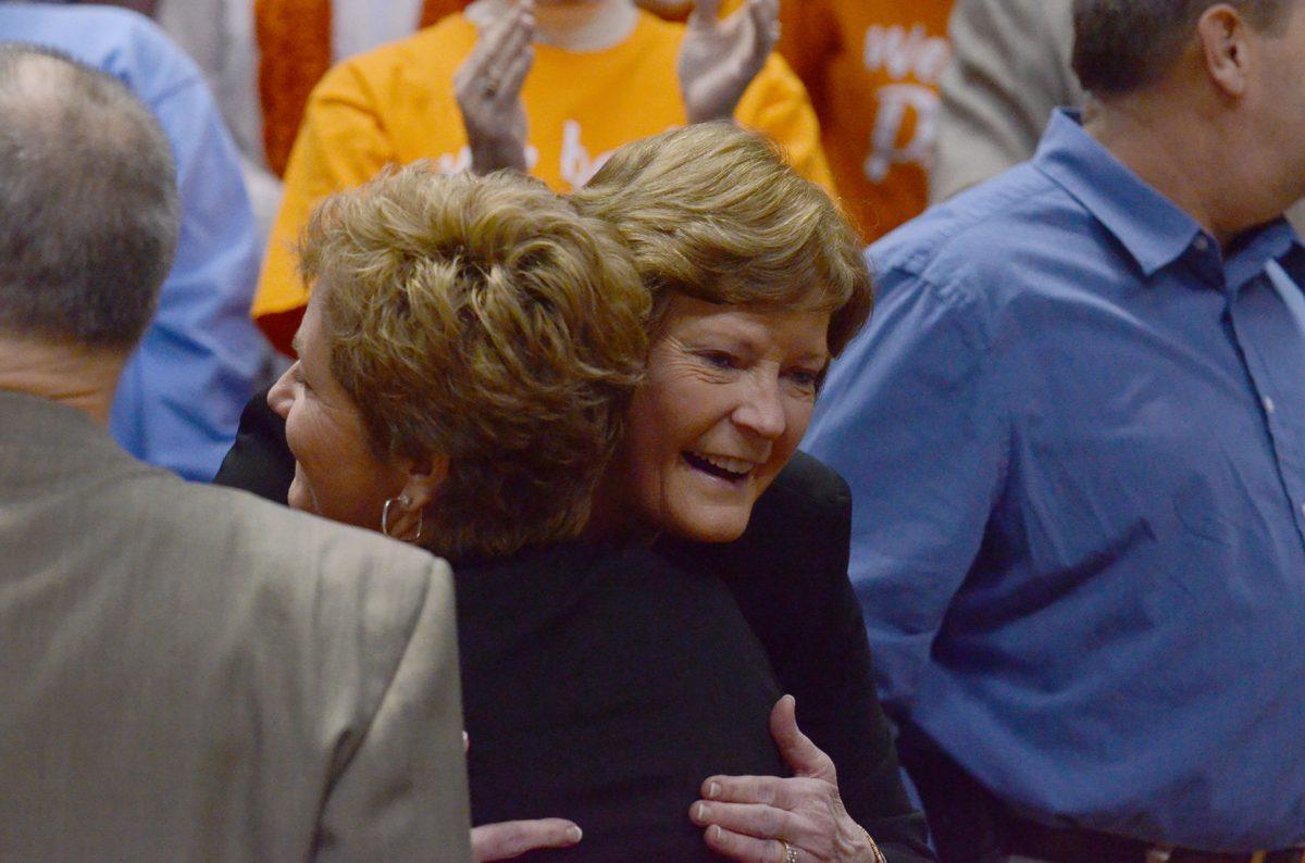 Pat Summitt hugs Janet McGee before the game against Alabama, the concluding game for "We Back Pat" week.