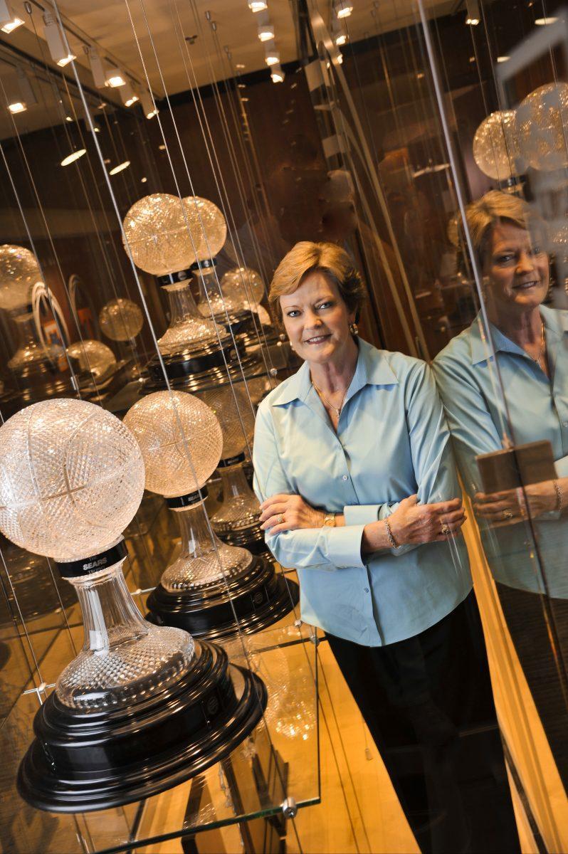 KNOXVILLE,TN - OCTOBER 13, 2011 - Portrait of Head Coach Pat Summitt with all eight of her NCAA National Championship Trophies at Thompson-Boling Arena in Knoxville, TN. Photo By Tennessee Athletics