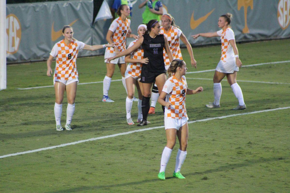 Several players line up to prepare a defense against the University of Washington on Aug. 25 2016.