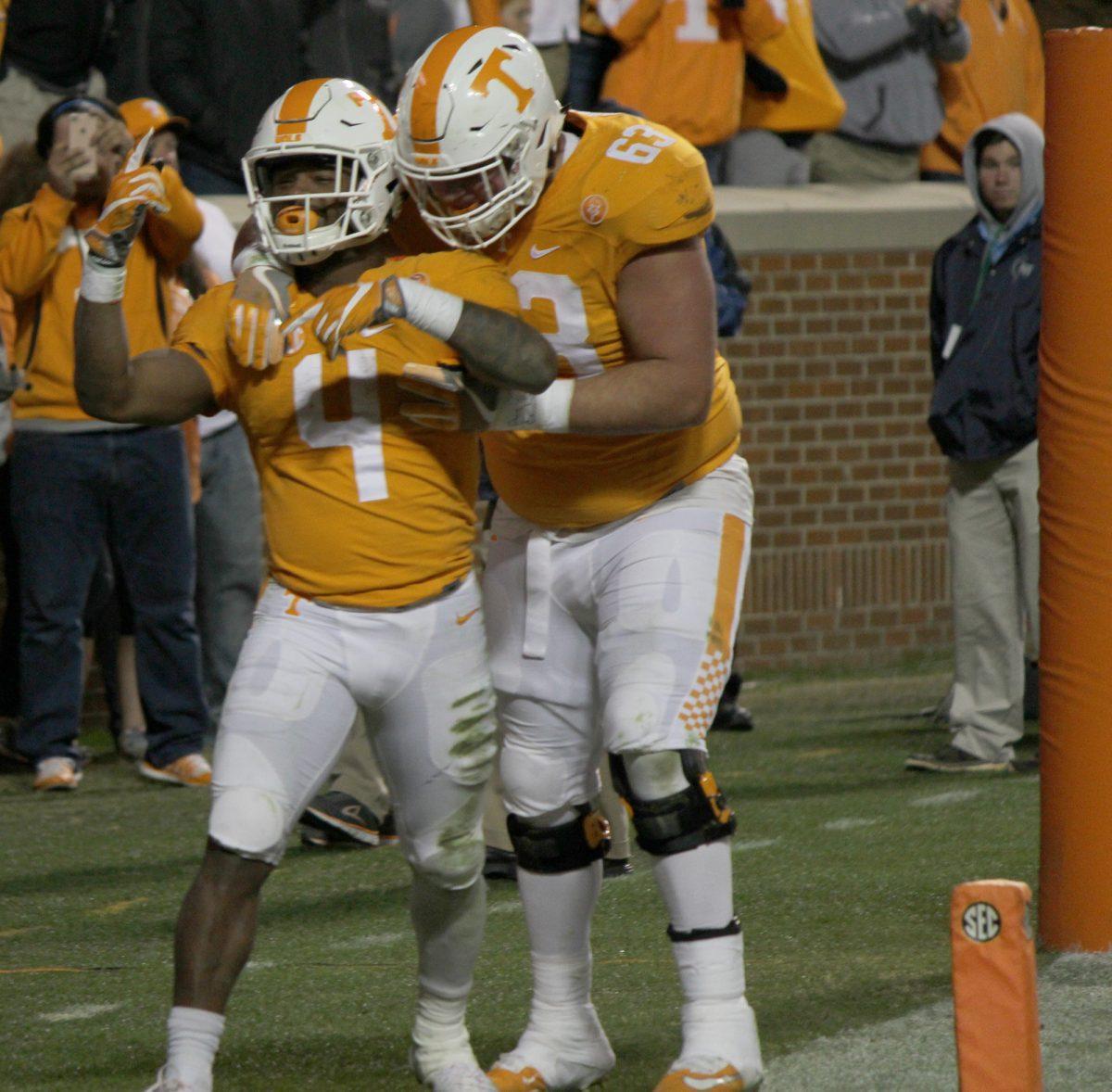 John Kelly, #4, celebrates his touchdown against Missouri with Brett Kendrick, #63, on Nov. 19, 2016.