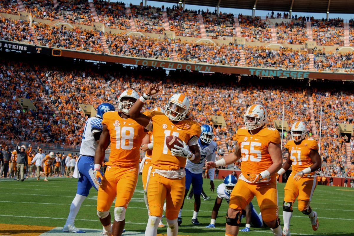 Josh Dobbs, #11, celebrates after scoring a touchdown against Kentucky on Nov. 12, 2016.