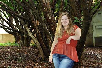 Here Caroline Norris, Design Editor, leans awkwardly against a random tree. 