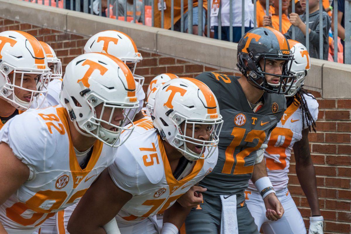 Quinten Dormady, QB #12, and the Tennessee Volunteers about to enter Neyland Stadium.