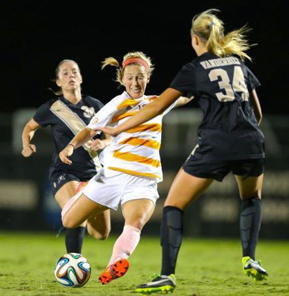 KNOXVILLE, TN - October 19, 2014: Midfielder Michele Christy #12 of the Tennessee Lady Volunteers at the Goal Pink game that features the SEC match between the University of Tennessee Lady Volunteers and the Vanderbilt University Commodores at Regal Soccer Stadium in Knoxville, TN.