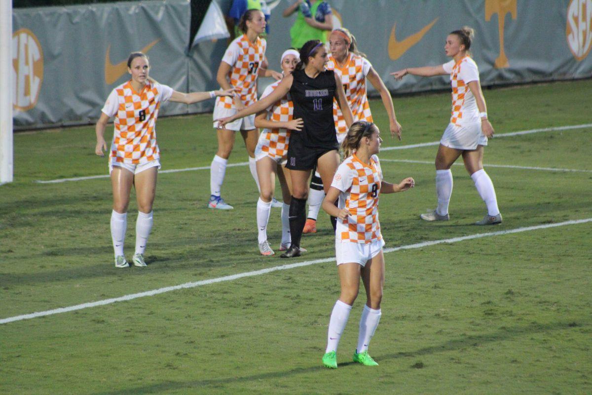 Several players line up to prepare a defense against the University of Washington on Aug. 25 2016.