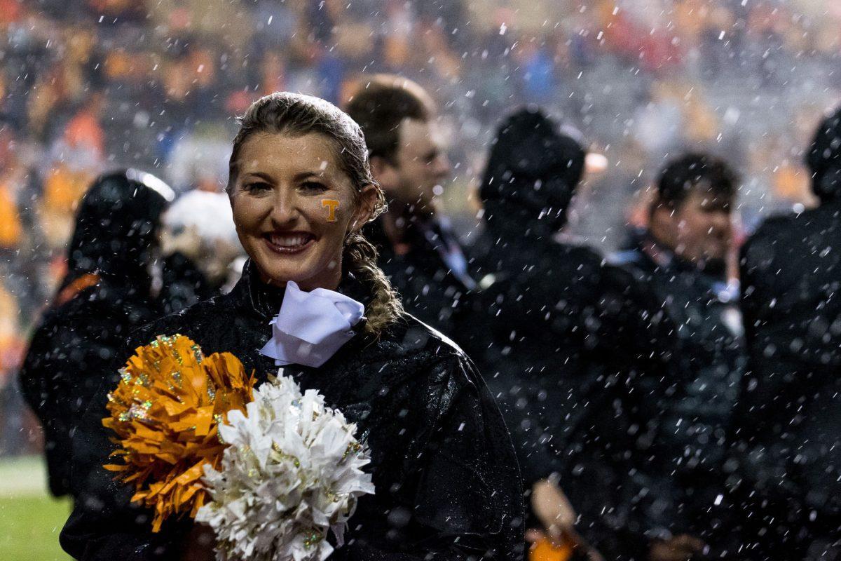 The Tennessee cheer team perform under the rain during the game against LSU at Neyland Stadium on Nov. 18, 2017.