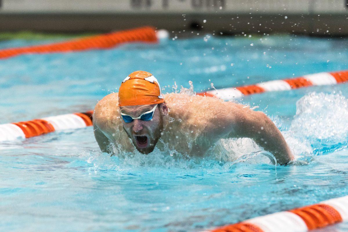 FILE - Ryan Coetzee in the 100 butterfly during the double meet against Kentucky and Indiana at Allan Jones Intercollegiate Aquatic Center on Oct. 27, 2017.