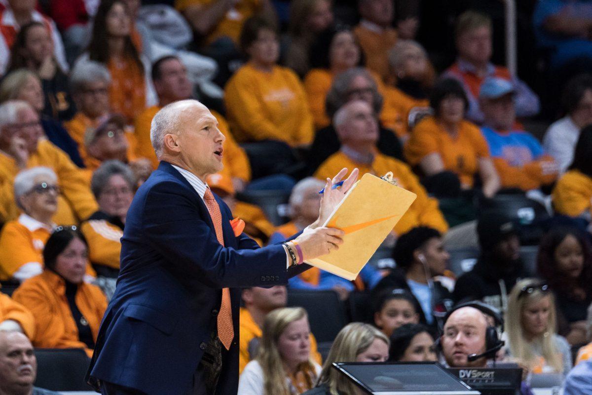 FILE - Dean Lockwood, assistant coach of the Tennessee Lady Volunteers women's basketball team during the game against Texas at Thompson-Boling Arena on Dec. 10, 2017.