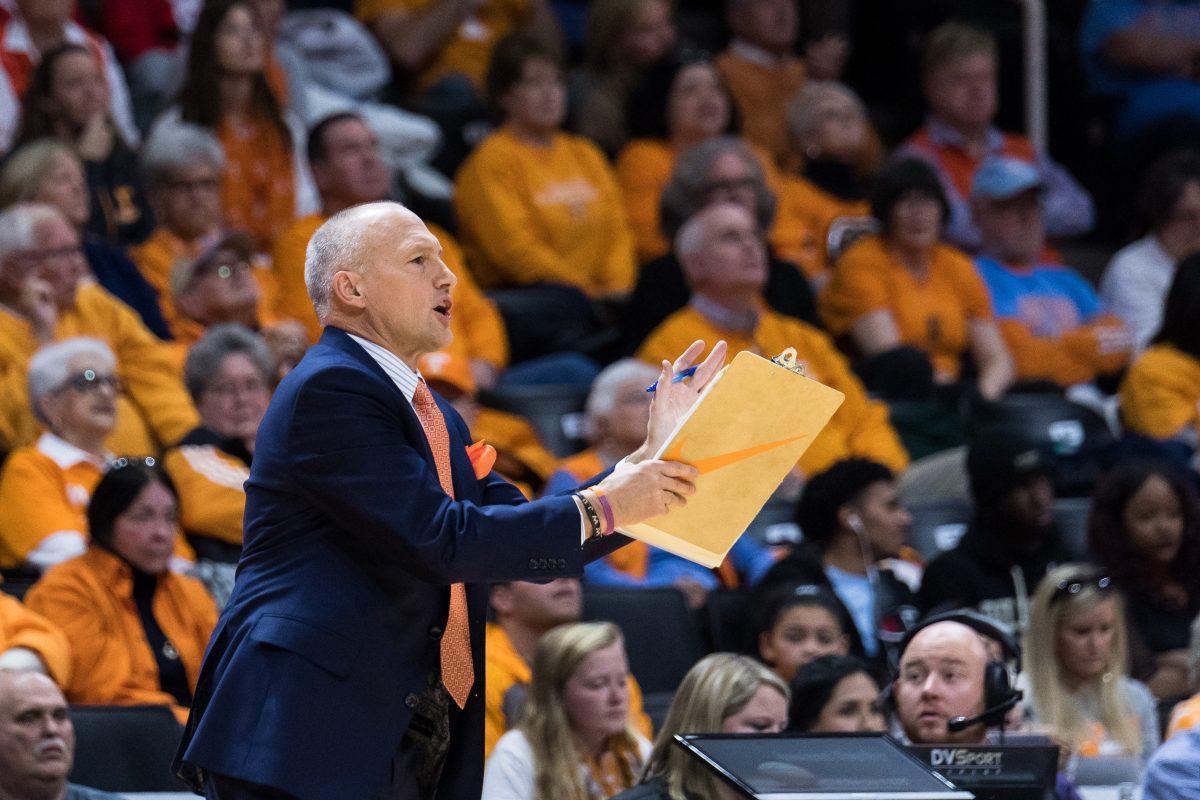FILE - Dean Lockwood, assistant coach of the Tennessee Lady Volunteers women's basketball team during the game against Texas at Thompson-Boling Arena on Dec. 10, 2017.