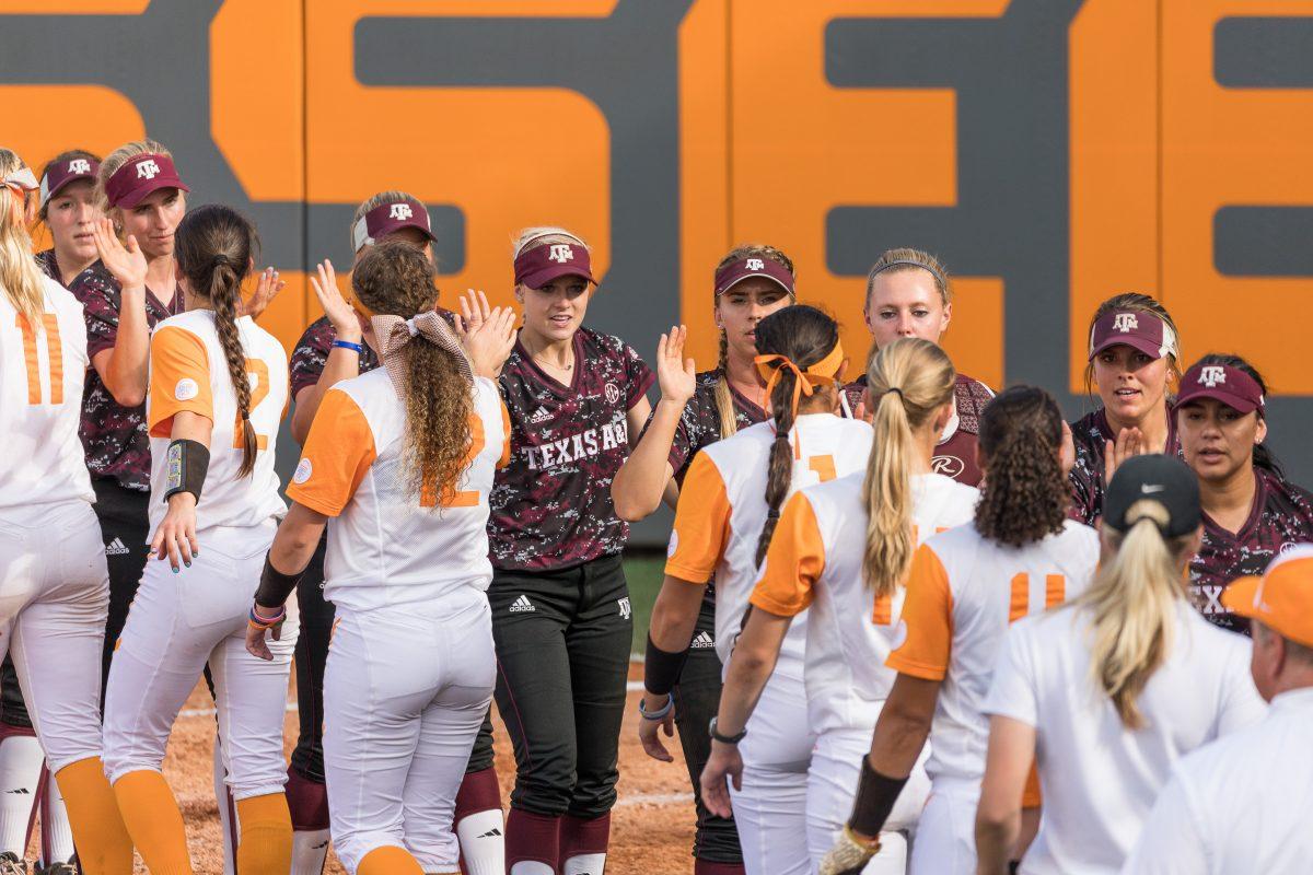The Tennessee Volunteers and Texas A&amp;M Aggies softball teams congratulating each other during the NCAA super regionals at Sherri Parker Lee Stadium on May 28, 2017.