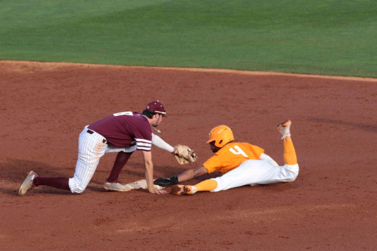 Jay Charleston,#4, avoids an out in game two of the Texas A &amp;M series on April 21, 2018. 