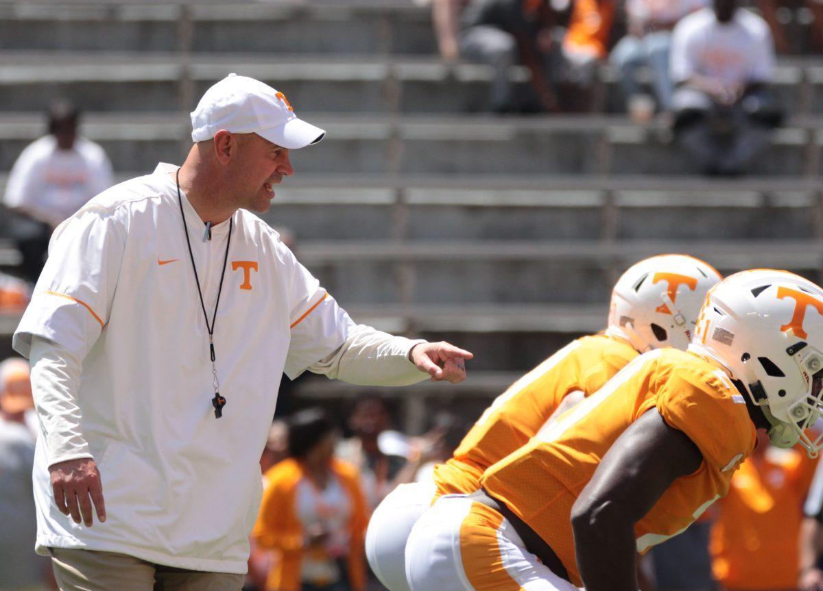 Tennessee head football coach Jeremy Pruitt communicates with players during the Orange and White Game on April 21. 